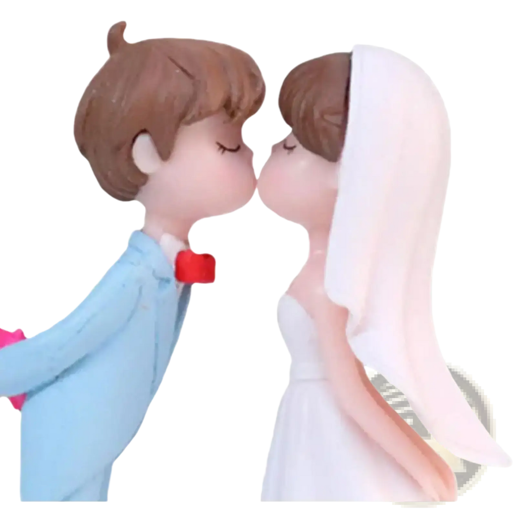 Wedding cake topper resin figurine of couple kissing with groom in light blue suit and bride in white dress and veil