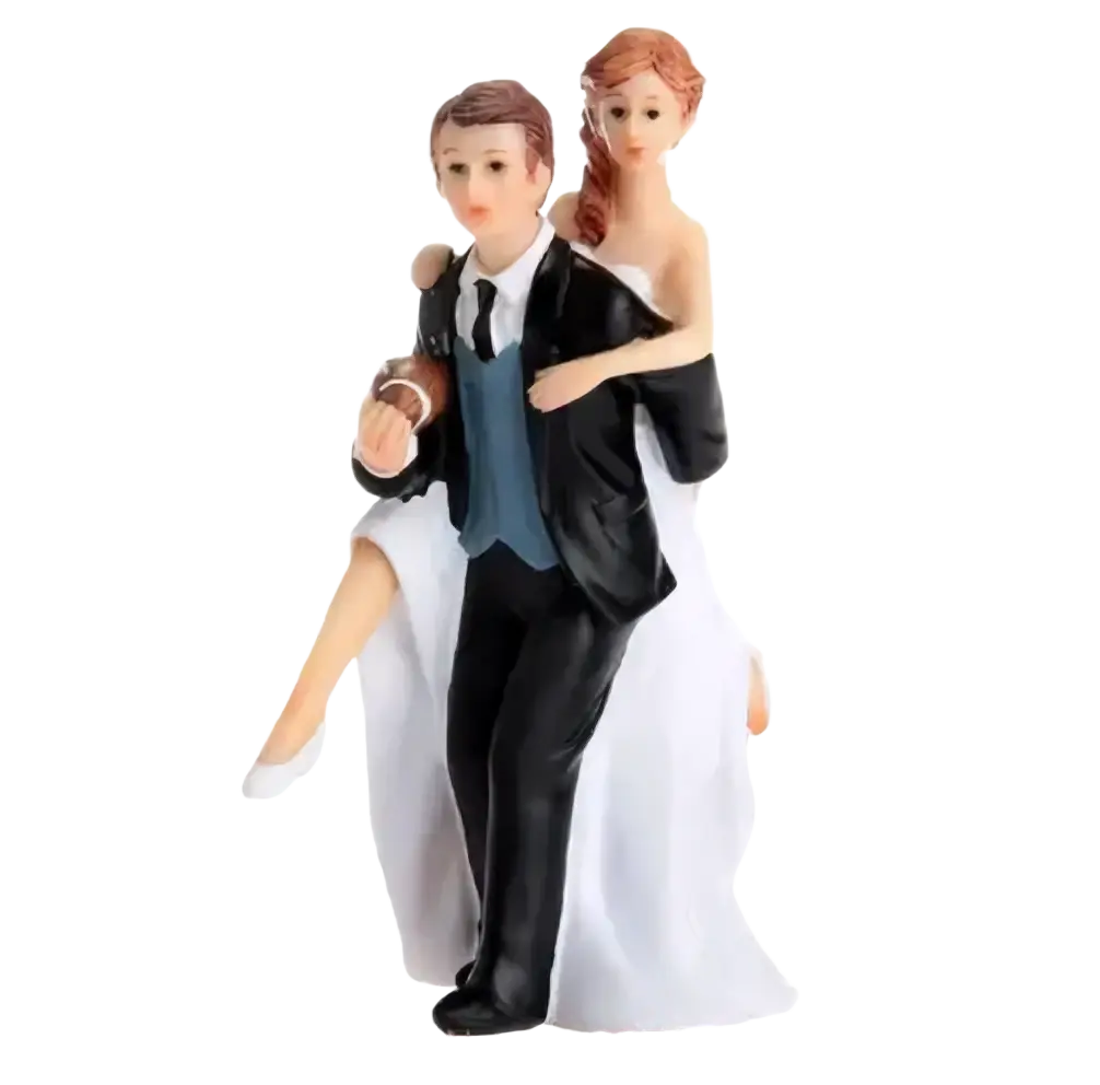 Wedding cake topper bride and groom resin figurine in black-tie and white gown posed in romantic embrace with fabric textures
