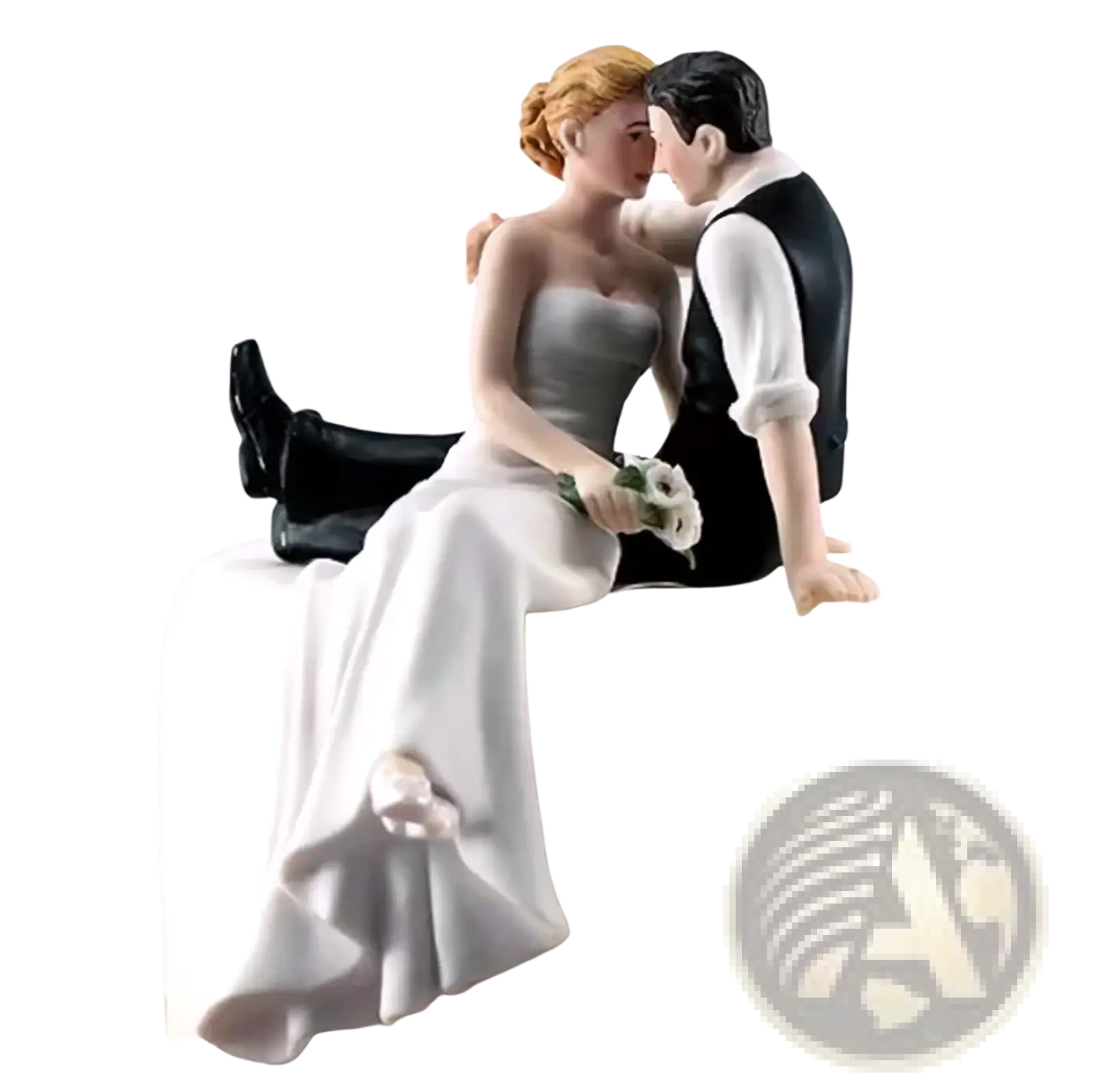Detailed resin wedding cake topper featuring a bride in white gown and groom in black vest on frosted cake edge