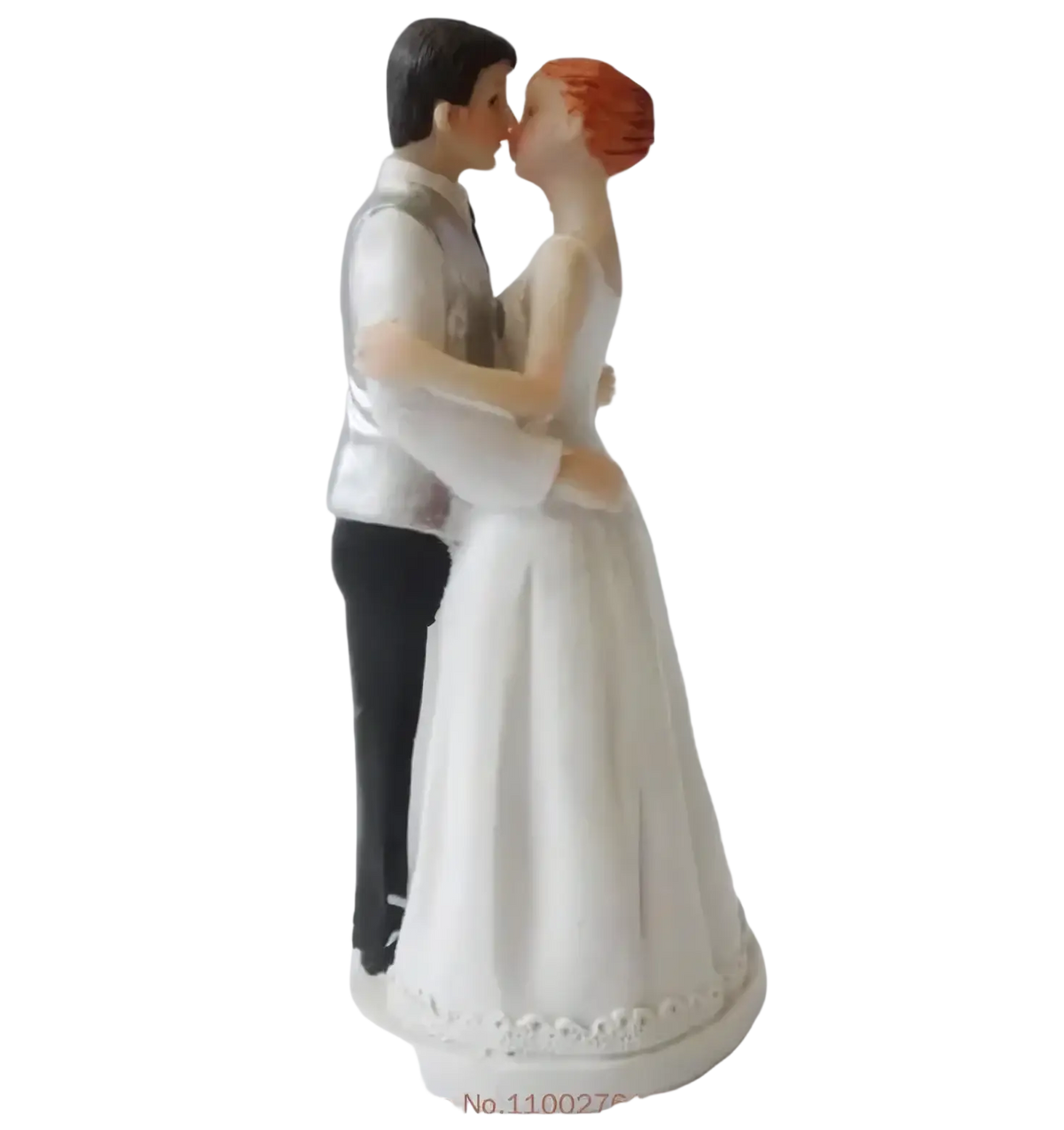 White resin wedding cake topper featuring a bride in a flowing gown and groom in silver vest and black pants figurine