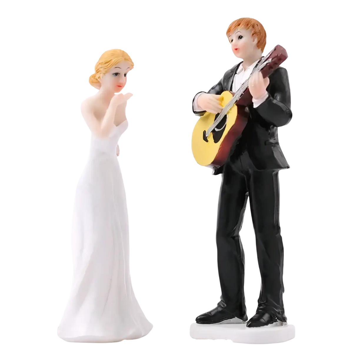 White resin wedding cake topper featuring bride in a flowing gown and groom in black tuxedo playing acoustic guitar