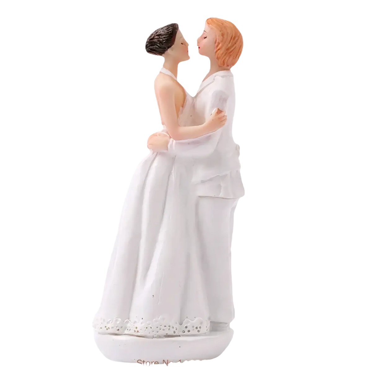 White resin wedding cake topper figurine of bride in lace gown and groom in formal attire embracing