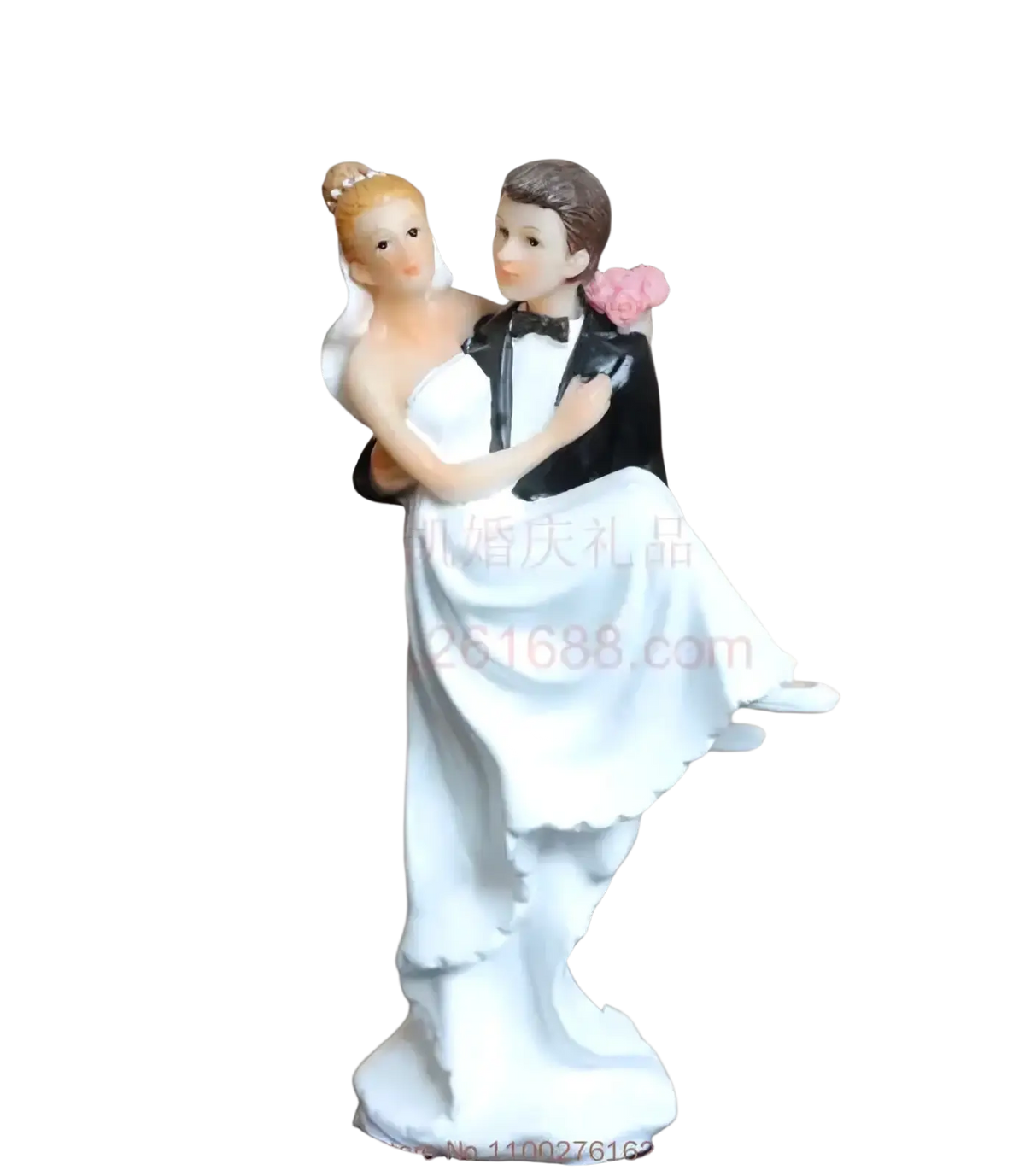 White and black resin wedding cake topper bride and groom figurine with bride in strapless gown and groom in tuxedo