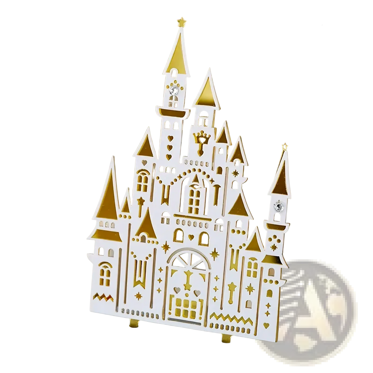 A delicate white and gold acrylic castle wedding cake topper with laser-cut details and sparkling tower embellishments