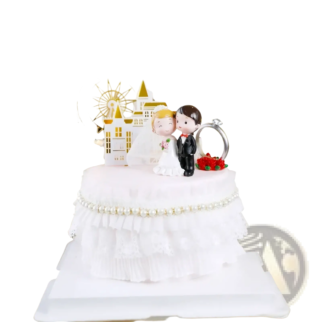White wedding cake topper featuring acrylic bride and groom figurine with gold castle and ferris wheel decor