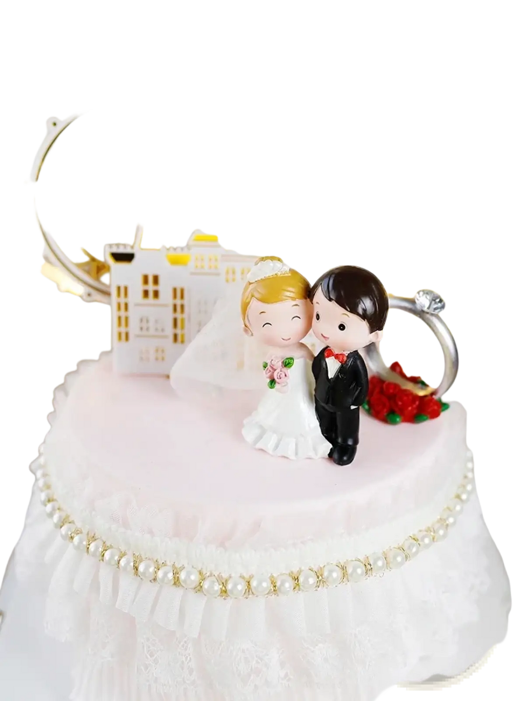 White and gold wedding cake topper featuring a cartoon bride and groom figurine with pearl trim acrylic decor