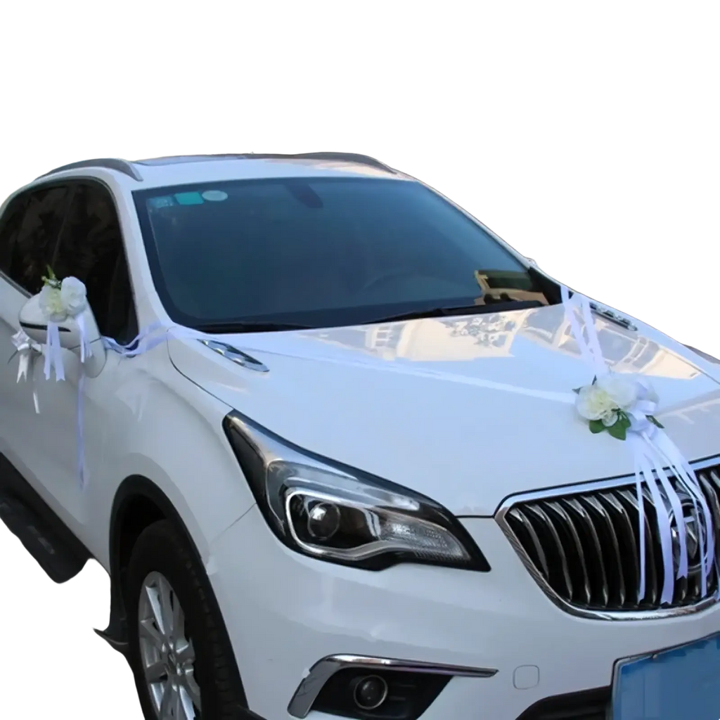 White buick encore suv decorated with white artificial floral decorations and ribbons for wedding car use