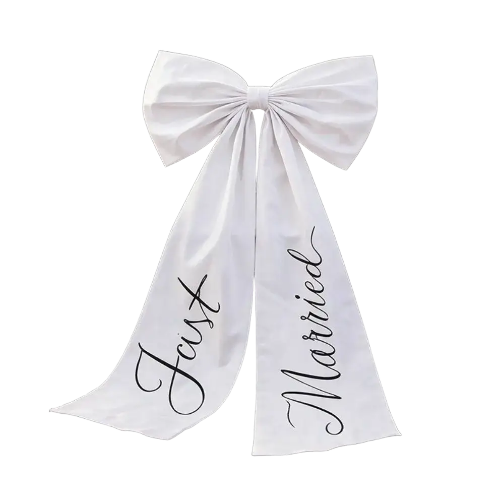 White satin wedding car bow with just married in black cursive on each tail for wedding decoration