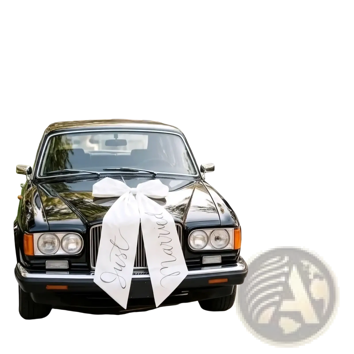 Black classic rolls royce with a large white satin wedding car bow satin bridal decoration ribbon on the front grille