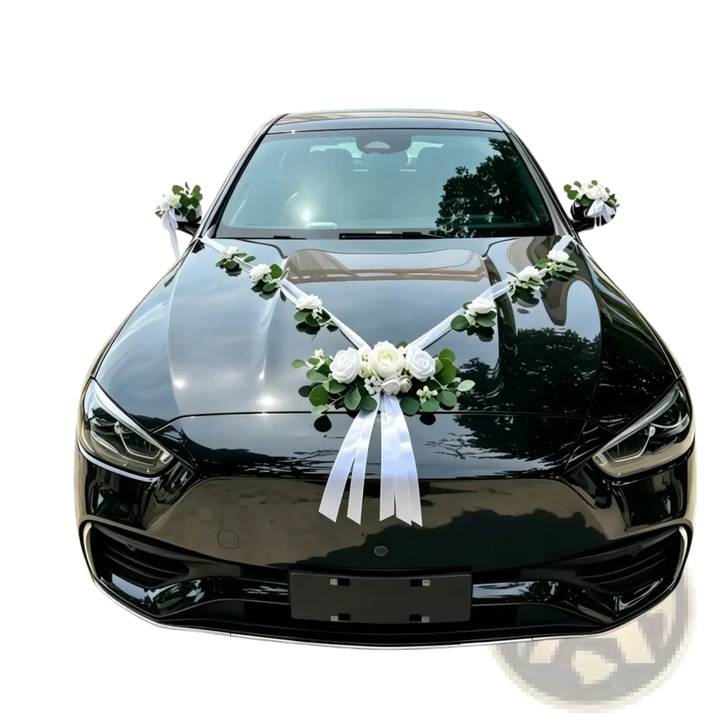 Black glossy sedan decorated with white artificial rose and eucalyptus floral arrangements and ribbons for weddings