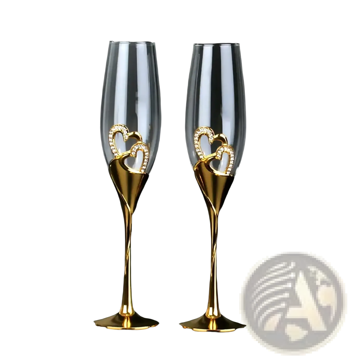 A pair of elegant gold champagne flutes with intertwined heart-shaped rhinestone embellishments for weddings
