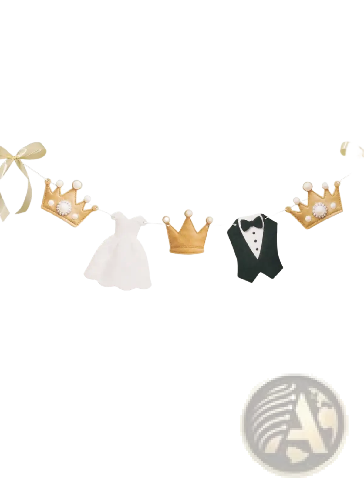 A delicate gold crown garland with pearl embellishments featuring white dress and black tuxedo cutouts for wedding decor