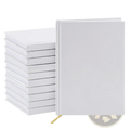 Stack of white hardcover wedding guest books with gold ribbon bookmarks for blank memory album use
