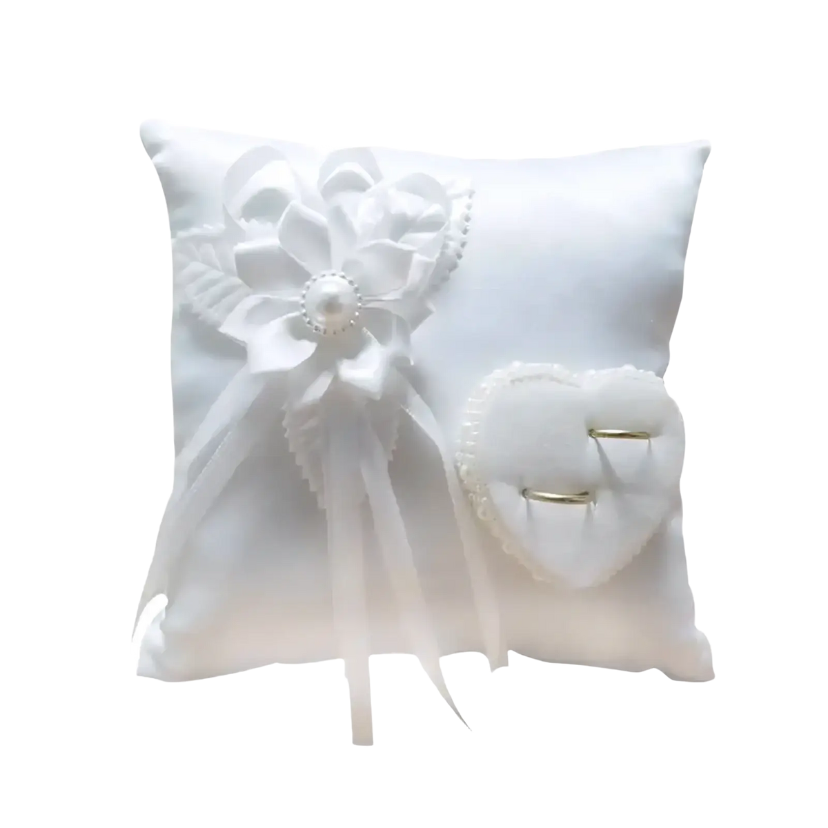White satin heart wedding ring pillow adorned with a delicate floral bow and heart shaped ring holder for ceremony