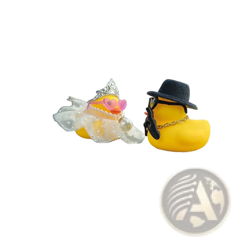 Two yellow rubber duck figurines dressed as a princess and gentleman wedding car dashboard couple ornament