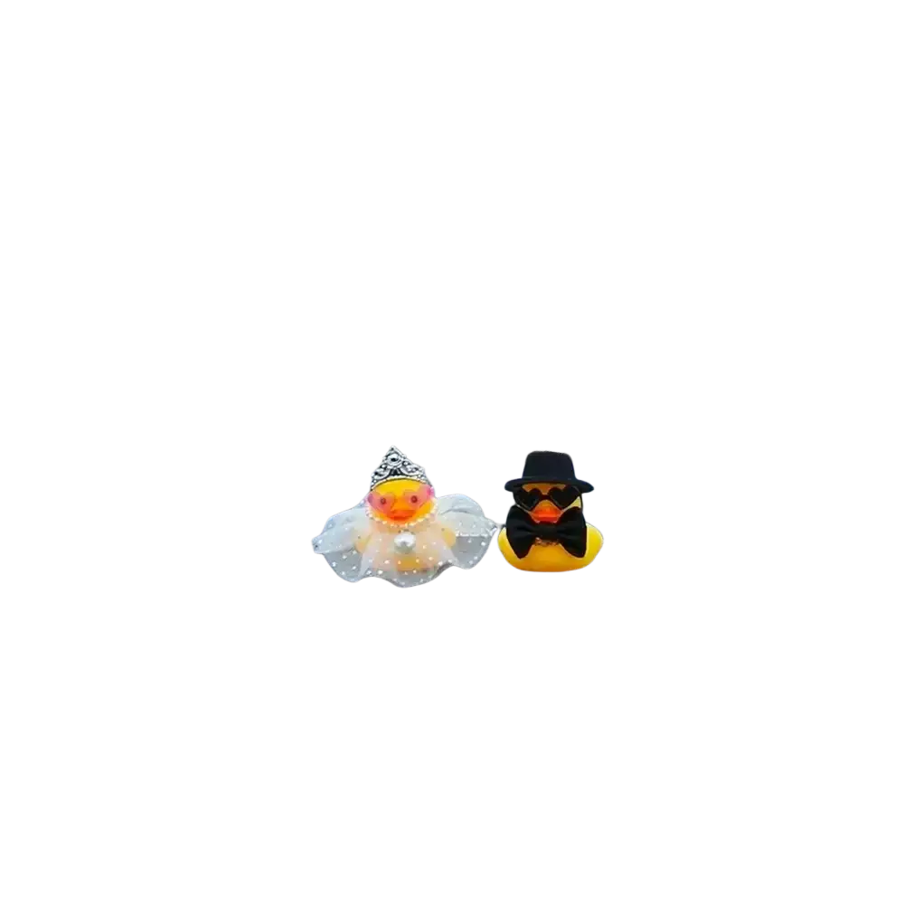 A charming yellow rubber duck couple ornament for car dashboard featuring bride in white gown and groom with fedora