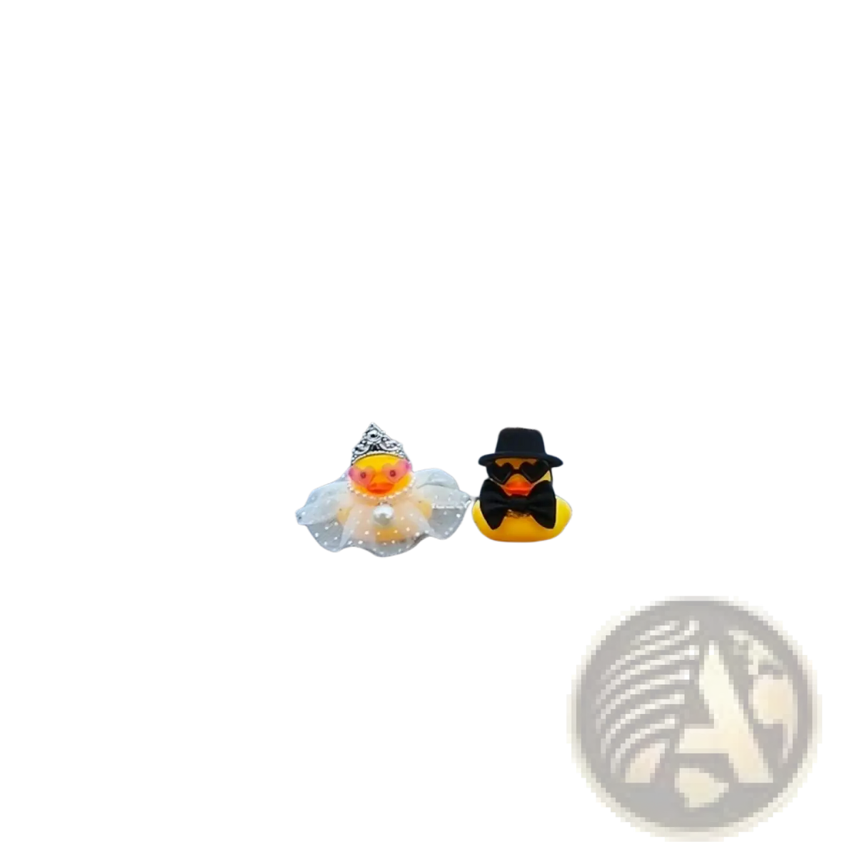 A charming yellow rubber duck wedding car dashboard couple ornament with groom in black hat and bride in tiara veil