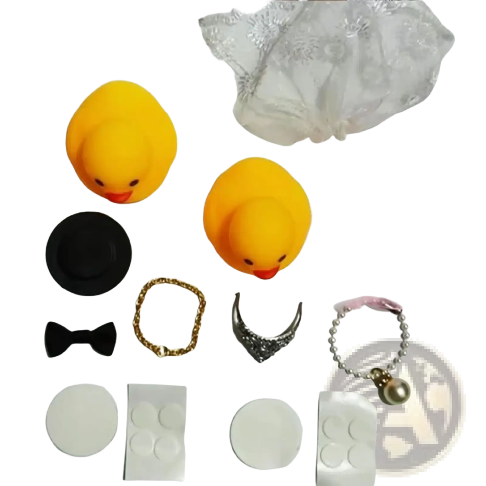 Two bright yellow rubber duck wedding couple ornaments with orange beaks and black eyes made of rubber