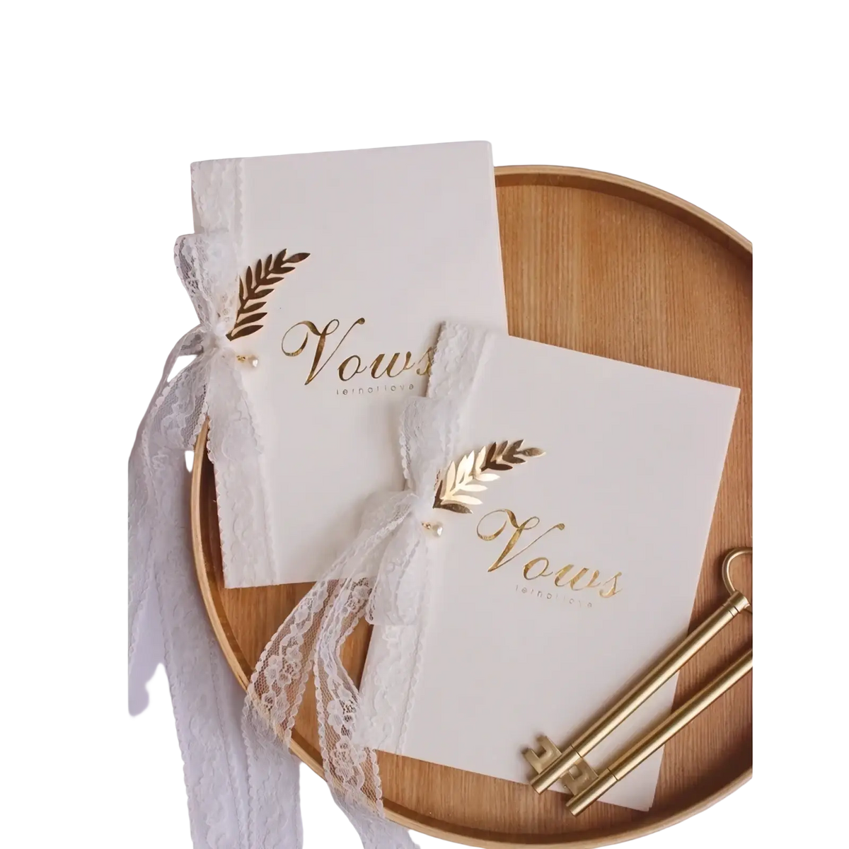 Elegant ivory wedding vow book with gold leaf script detailing and white lace ribbon from vow books set with keys