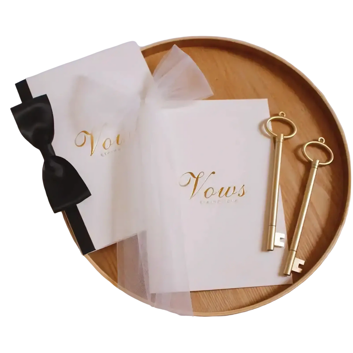 White wedding vow book set with gold foil lettering sheer tulle accents and two ornate golden skeleton keys