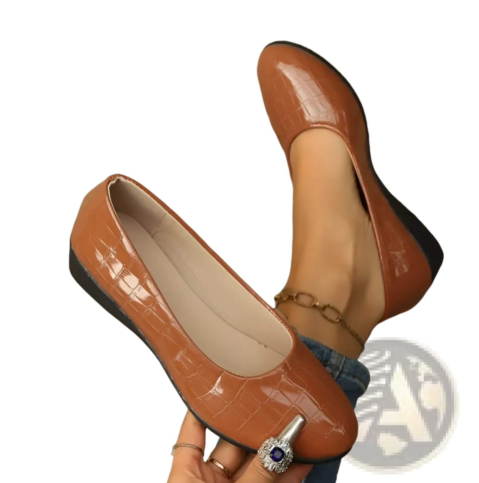 Tan wedge flats crocodile embossed patent leather shoes with a black rubber sole for stylish everyday wear