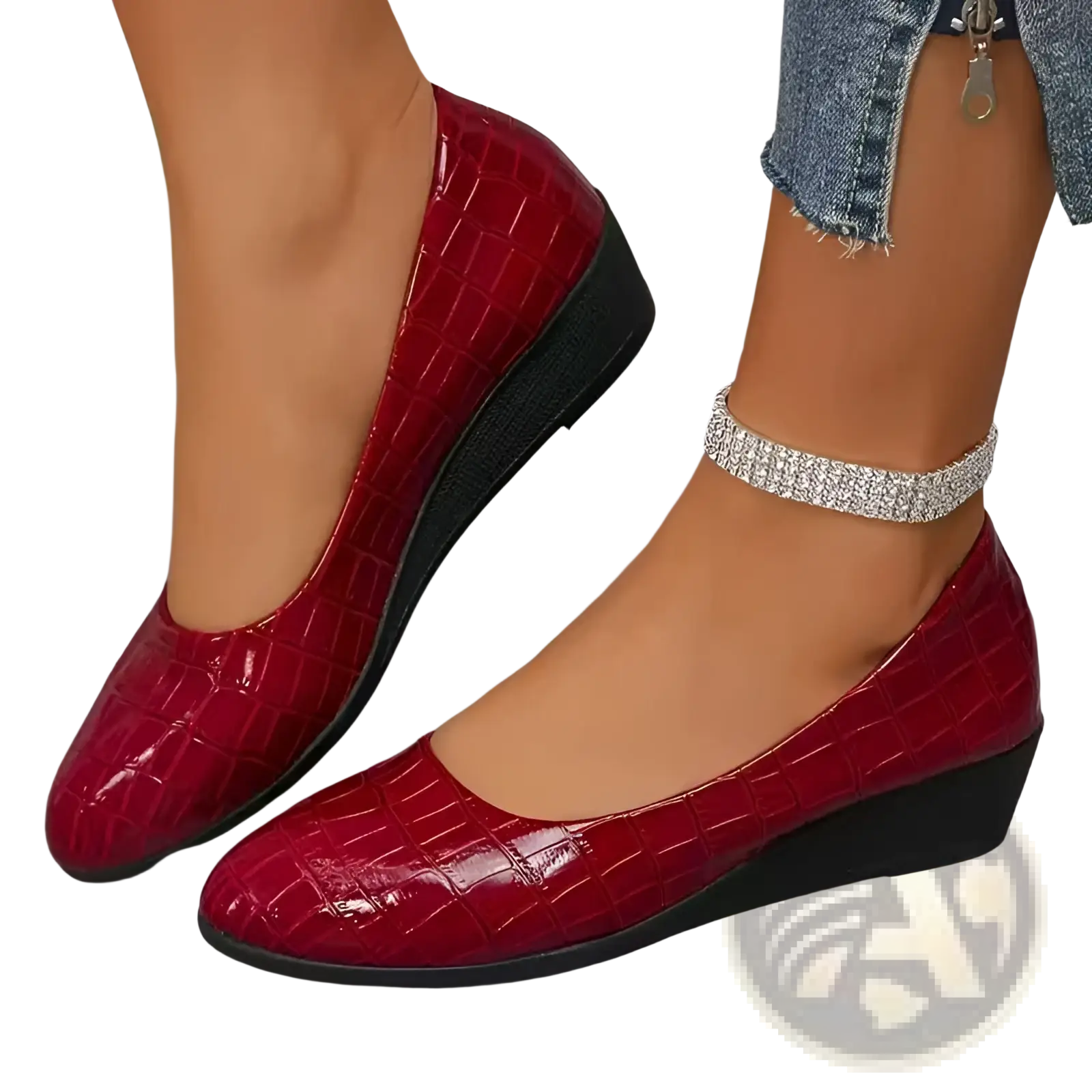 Red crocodile-embossed patent leather wedge flats with a glossy finish and black soles for stylish comfort