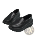 Black leather wedge heel platform slip on shoes with thick textured sole for comfortable everyday wear