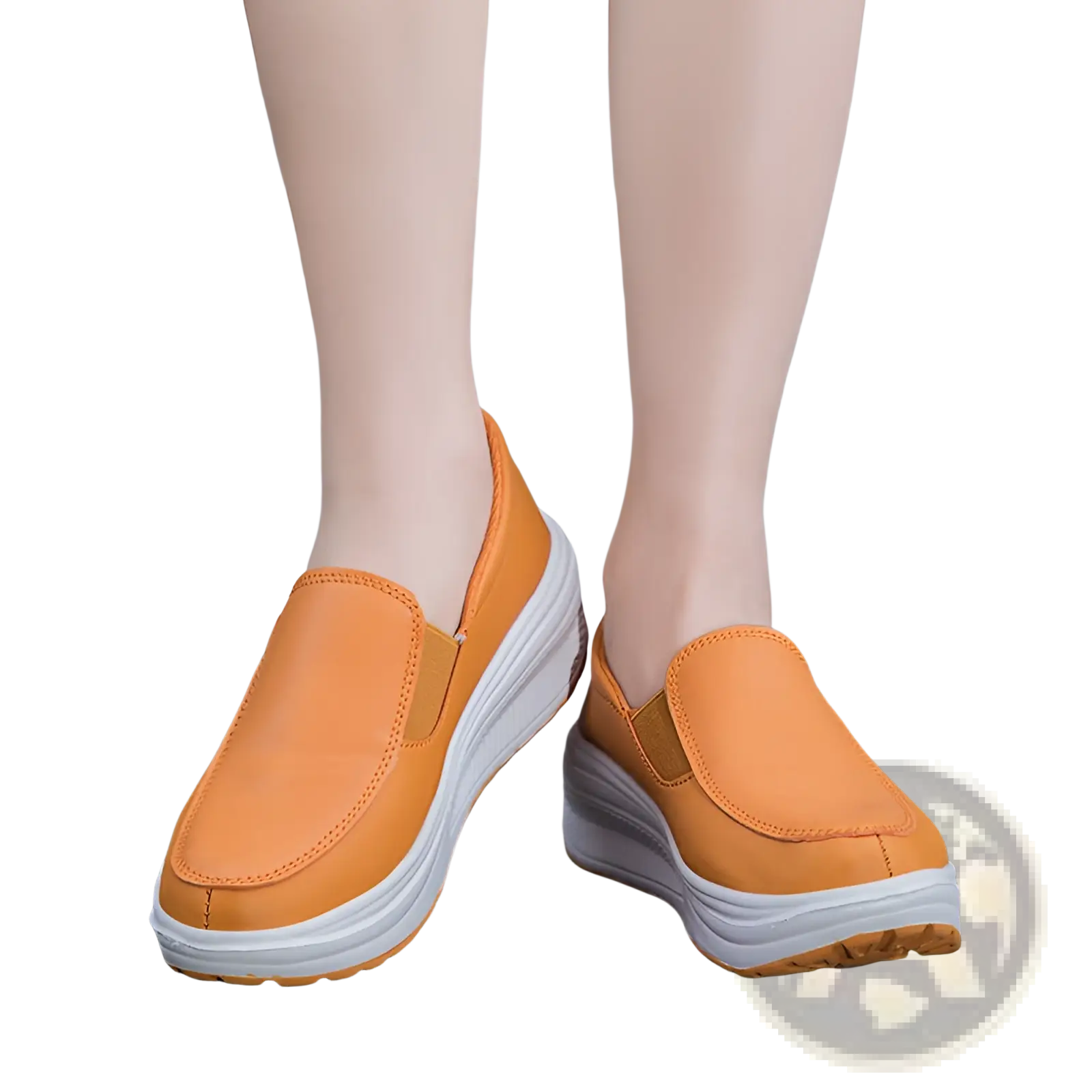 Wedge heel platform slip-on leather shoes in orange with a thick white sole and tan leather accents