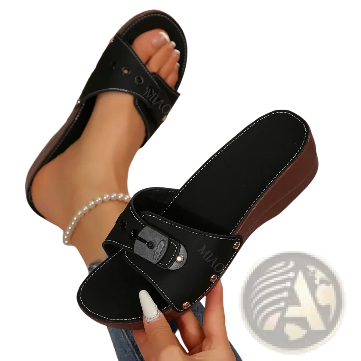 Black wedge platform slide sandals with brown sole and silver-toned buckle accents for casual summer wear