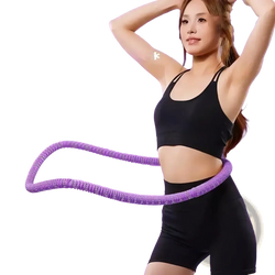 Weighted spring hula hoop in purple with textured, flexible design for easy spinning and core fitness exercises