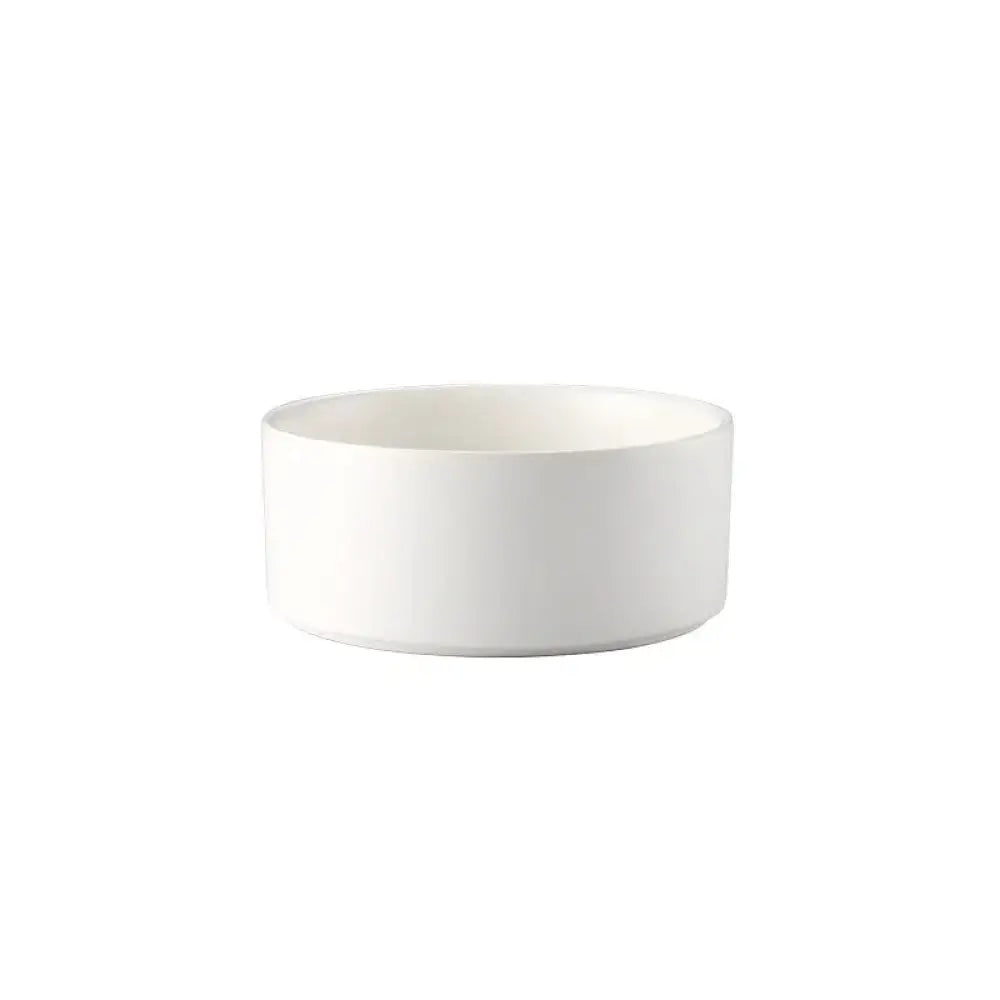 White ceramic bowl with smooth minimalist matte finish included in ceramic bowl set with wooden stands