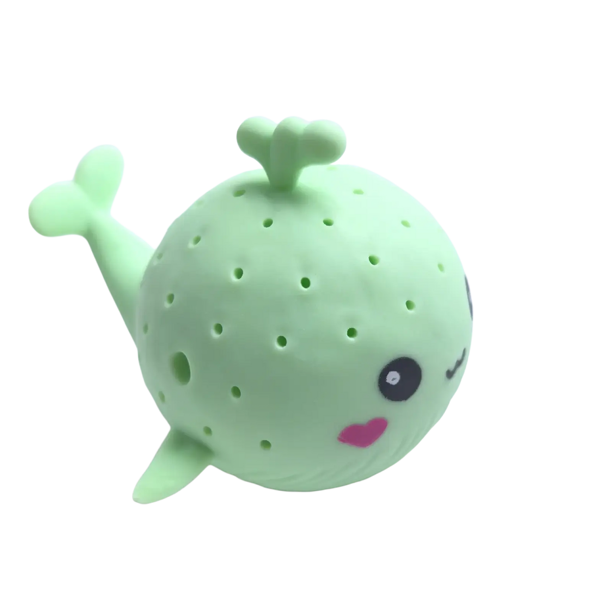 A cute light green silicone whale-shaped tea infuser with dotted pattern and pink heart mouth for kids bath toys