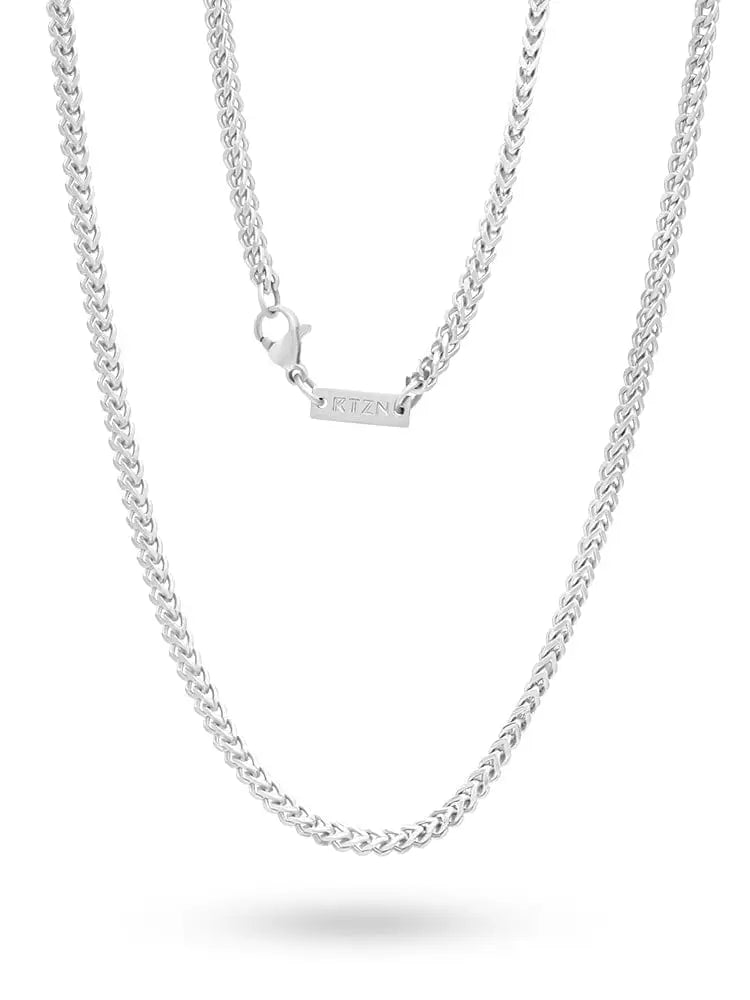 2.5mm silver wheat chain stainless steel necklace with polished finish and small rectangular rtzn engraved tag near clasp