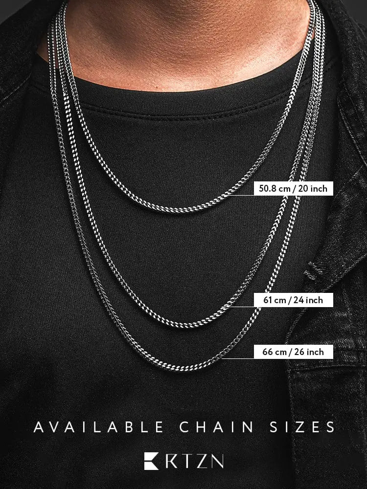 Three silver-toned 2.5mm stainless steel curb chain necklaces with polished metallic finish and varied lengths