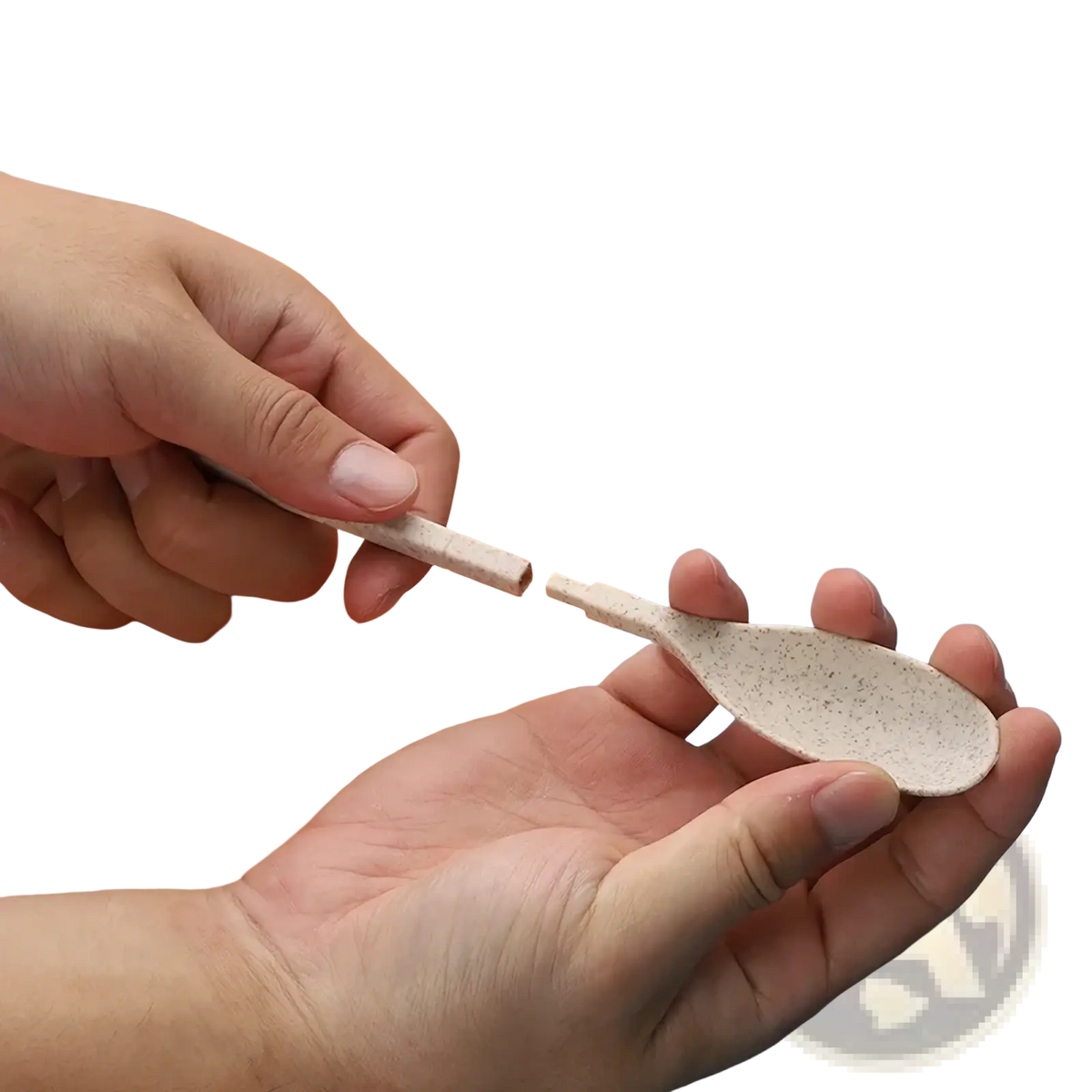 Beige speckled eco-friendly plastic spoon with detachable handle made from wheat straw in portable travel cutlery set