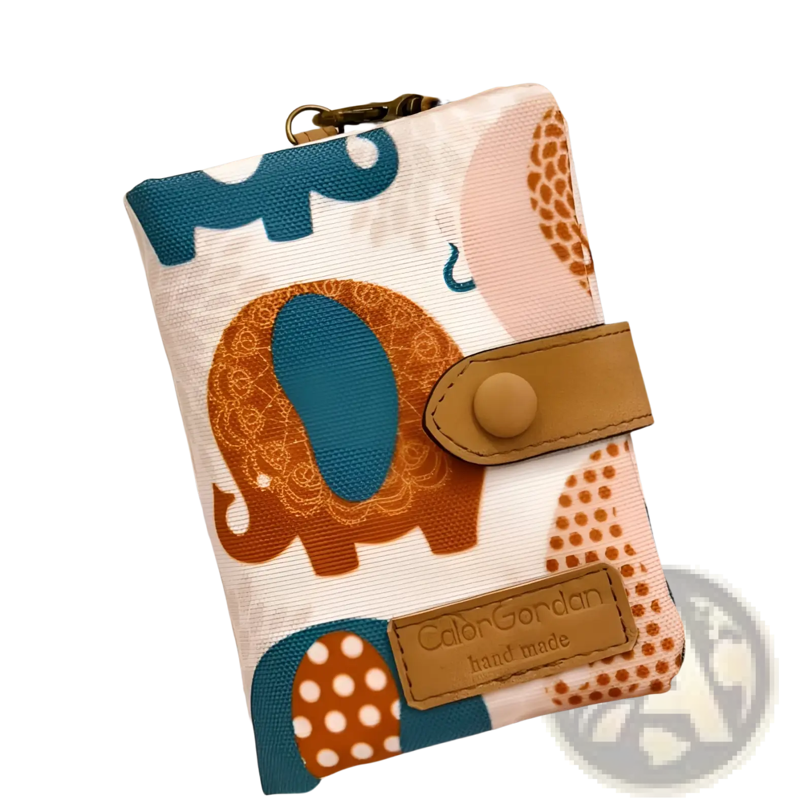 A white canvas tri fold multi card wallet with teal and orange elephant illustrations and a tan leather flap