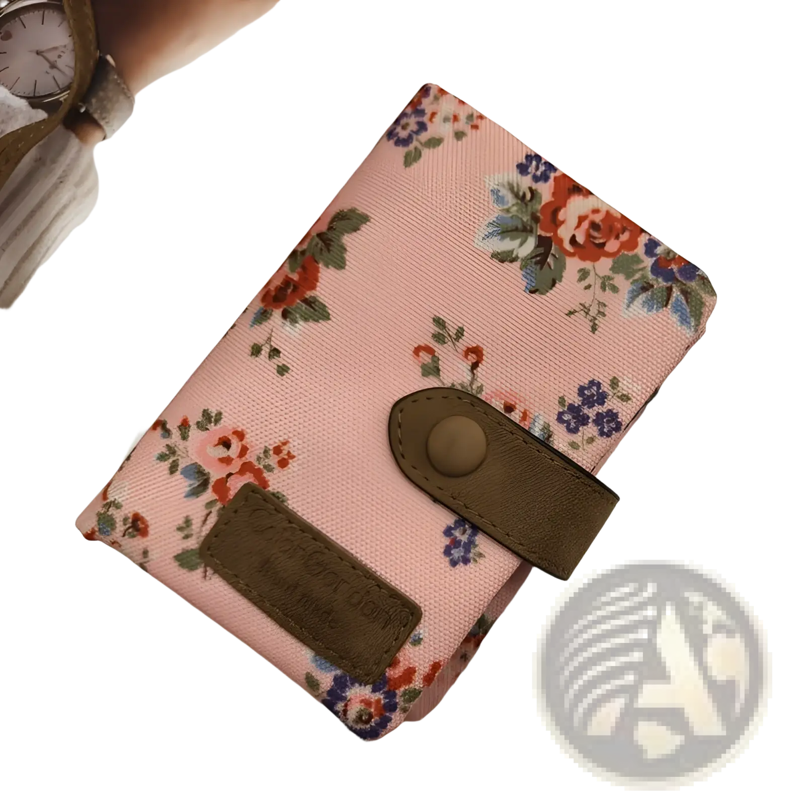 Whimsical patterned canvas tri fold multi card wallet with pink floral design and brown leather strap with button closure