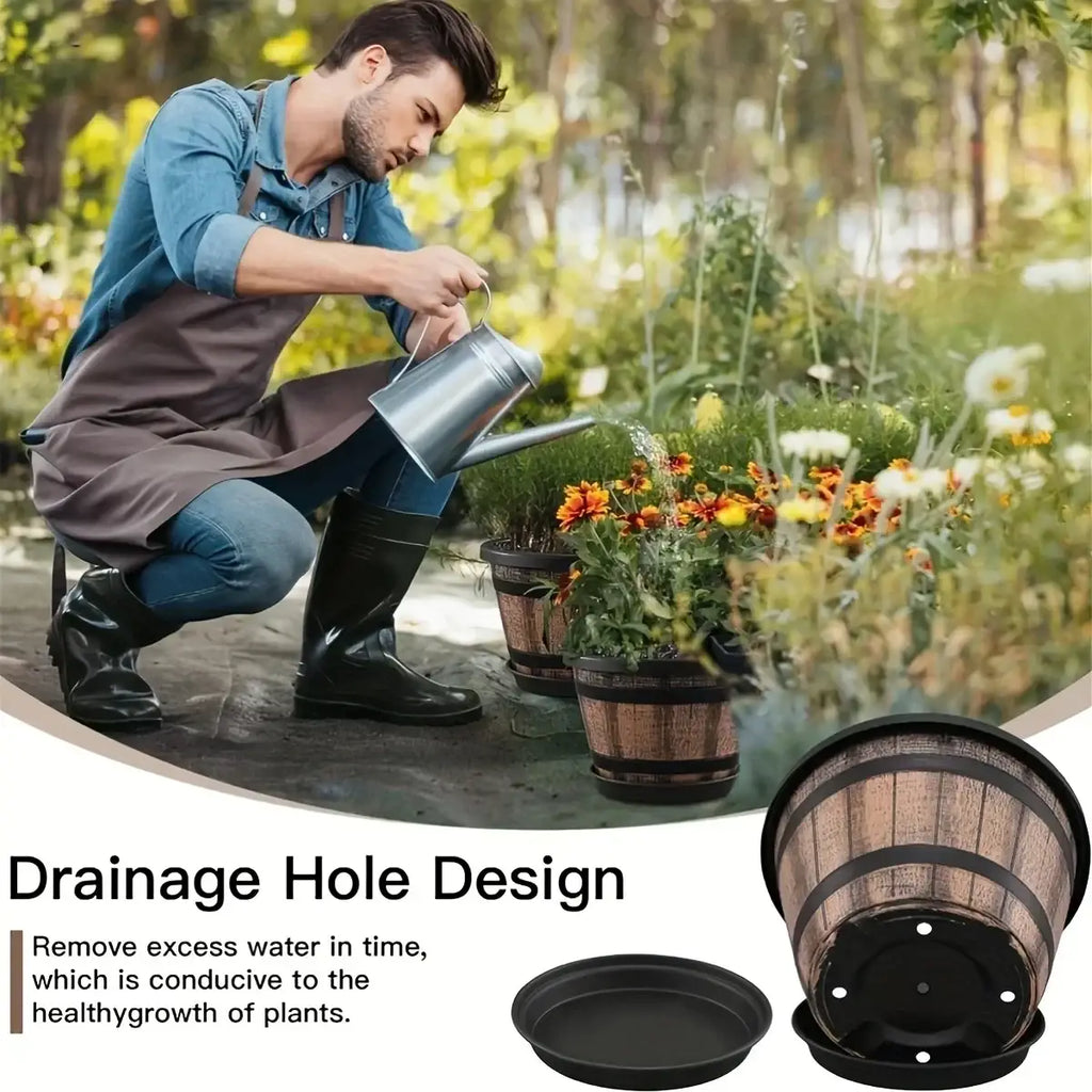 Metal watering can with long spout and handle next to whiskey barrel plastic planter pot with drainage holes for gardening