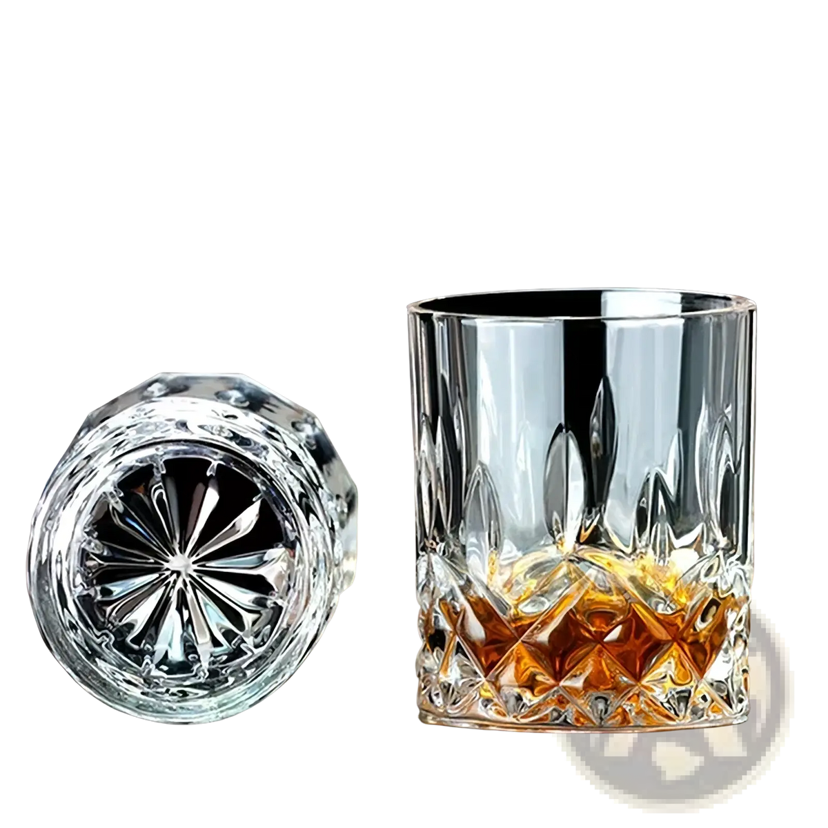 A double old-fashioned crystal whiskey glass with intricate faceted cuts in a whiskey stones gift set with wooden box