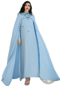 White beaded cape abaya maxi dress in flowing light blue fabric with intricate turquoise beading on neckline and sleeves