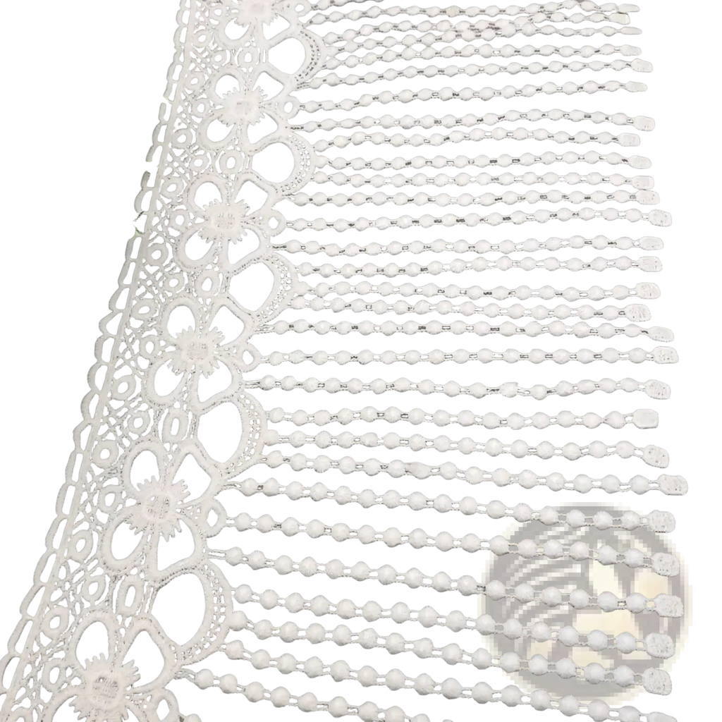 White beaded lace trim fabric featuring intricate white floral patterns and delicate beaded fringe detail