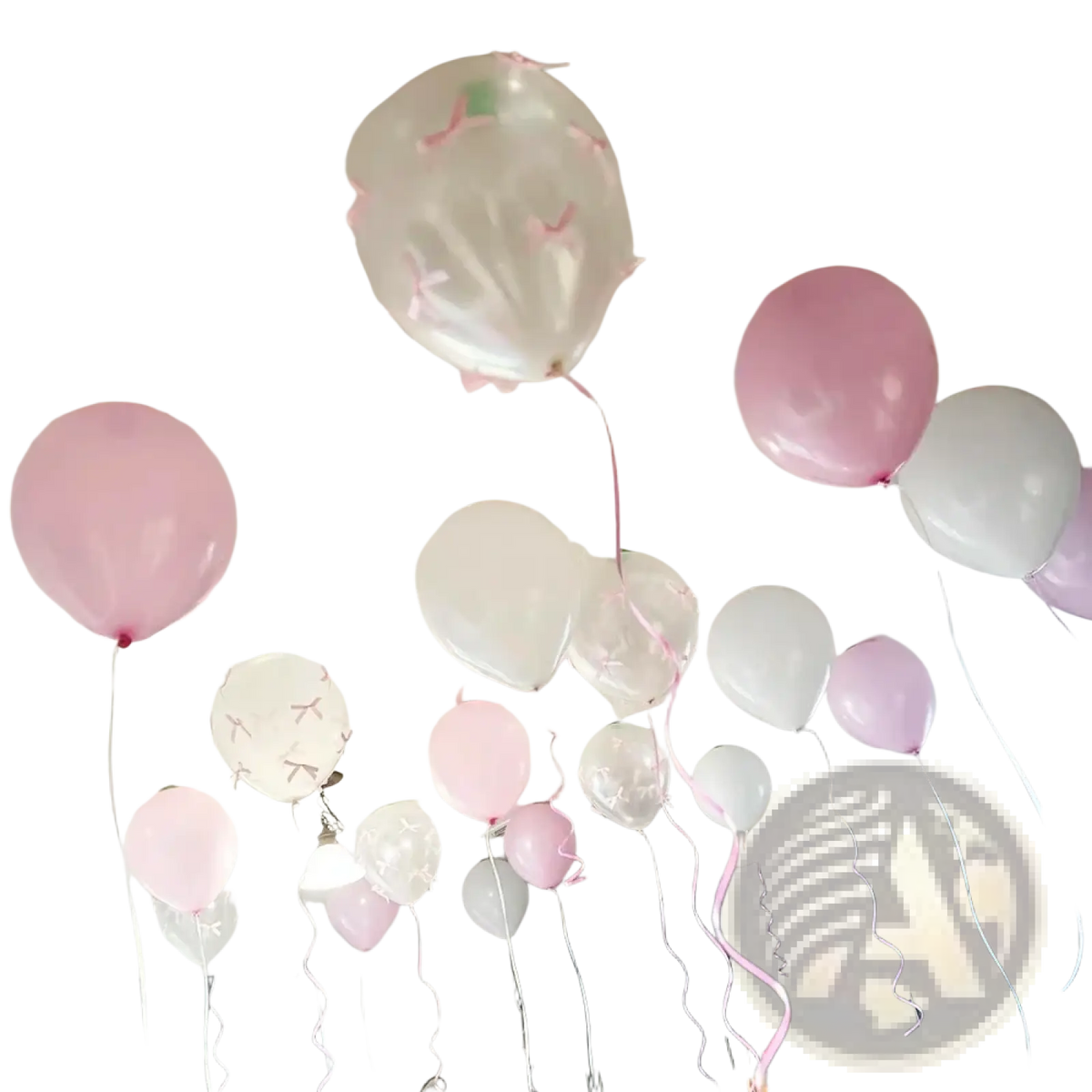 A cluster of pink white and clear white bow balloons with pink ribbons floating for party decor