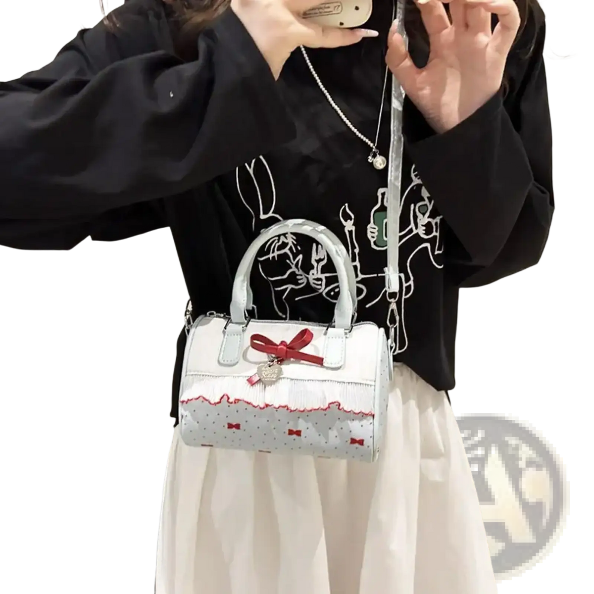 White bow crossbody pu leather handbag with white lace trim silver handles and a red bow accent