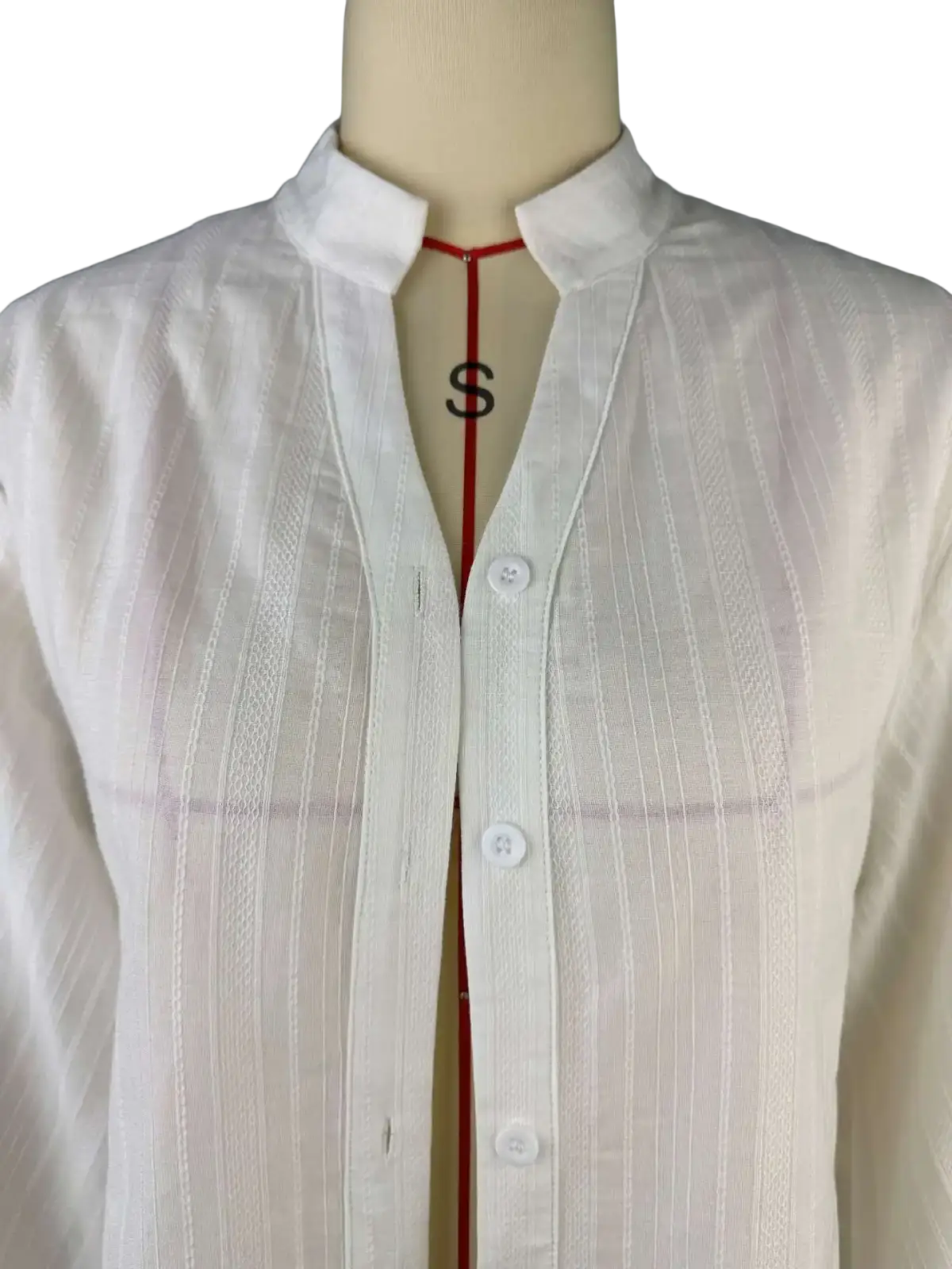 White cotton puff sleeve oversize blouse with subtle vertical ribbed texture and a crisp collar