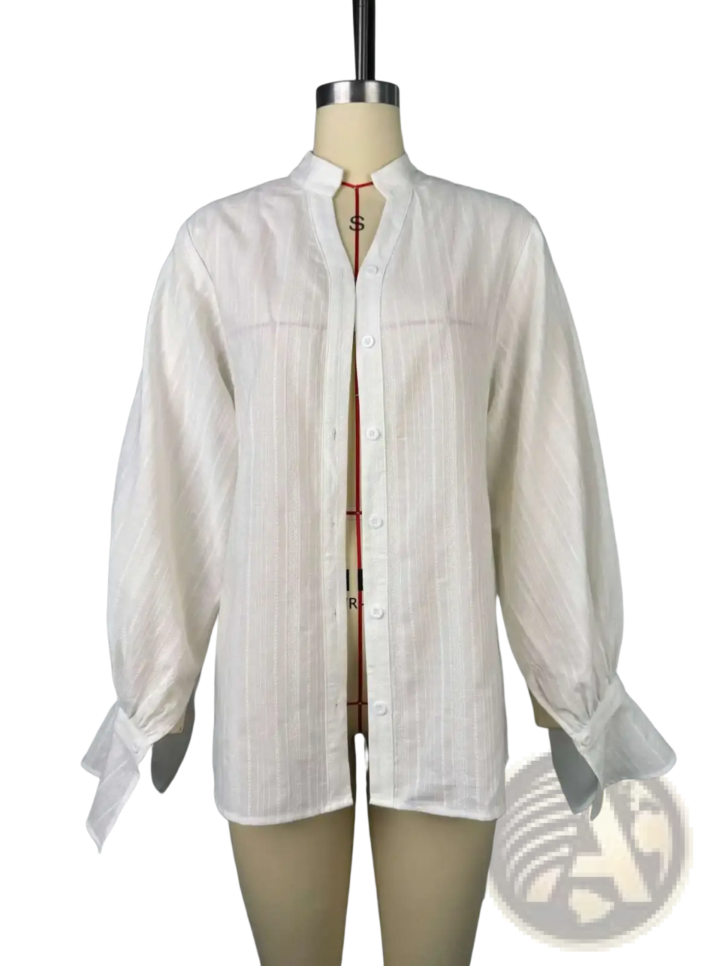 White cotton oversize blouse with puff sleeves and subtle vertical stripes featuring a mandarin collar