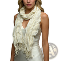 Cream-colored lightweight crinkle scarf with textured fabric and fringed edges ideal as a summer accessory