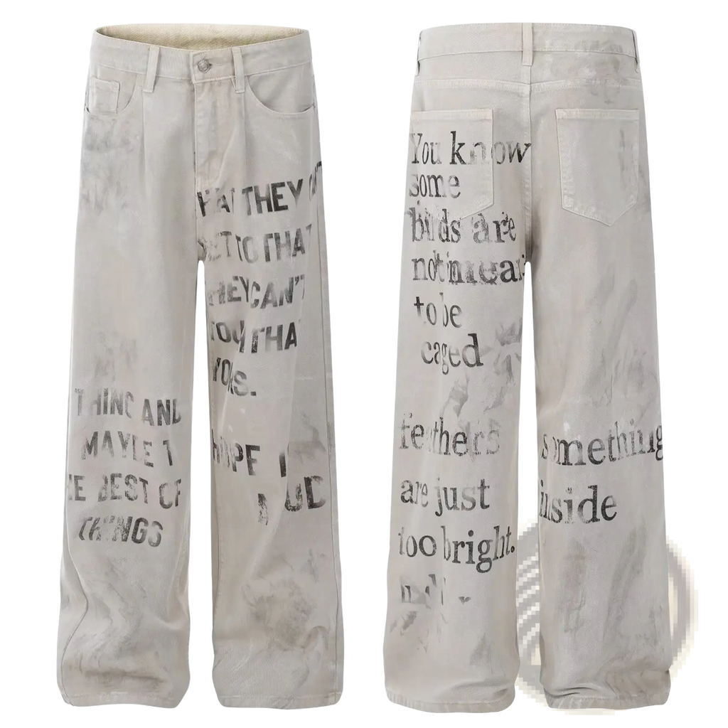 Off White distressed graffiti print cargo jeans featuring bold black typographic prints on the legs
