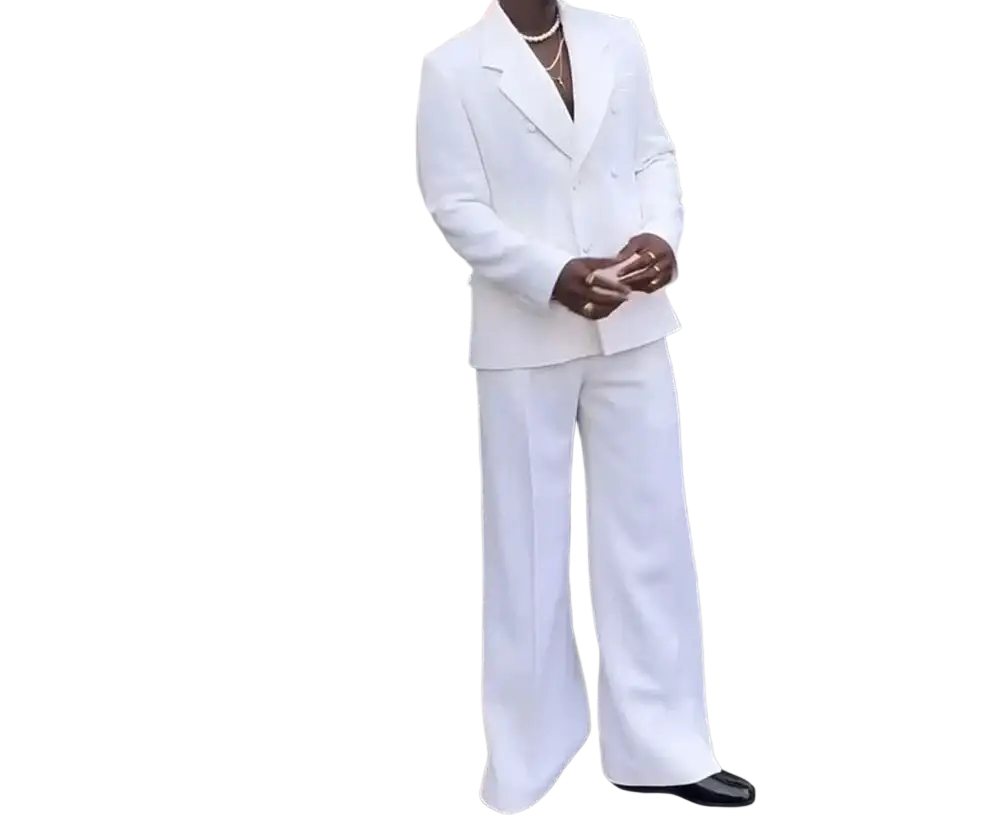 A crisp white double-breasted mens wedding tuxedo suit with wide-leg trousers crafted from smooth fabric