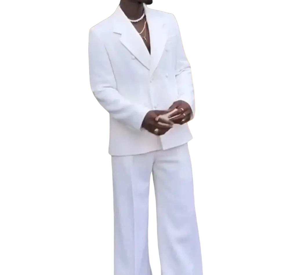 White double breasted mens wedding tuxedo suit with tailored lapels and wide leg trousers in crisp white fabric
