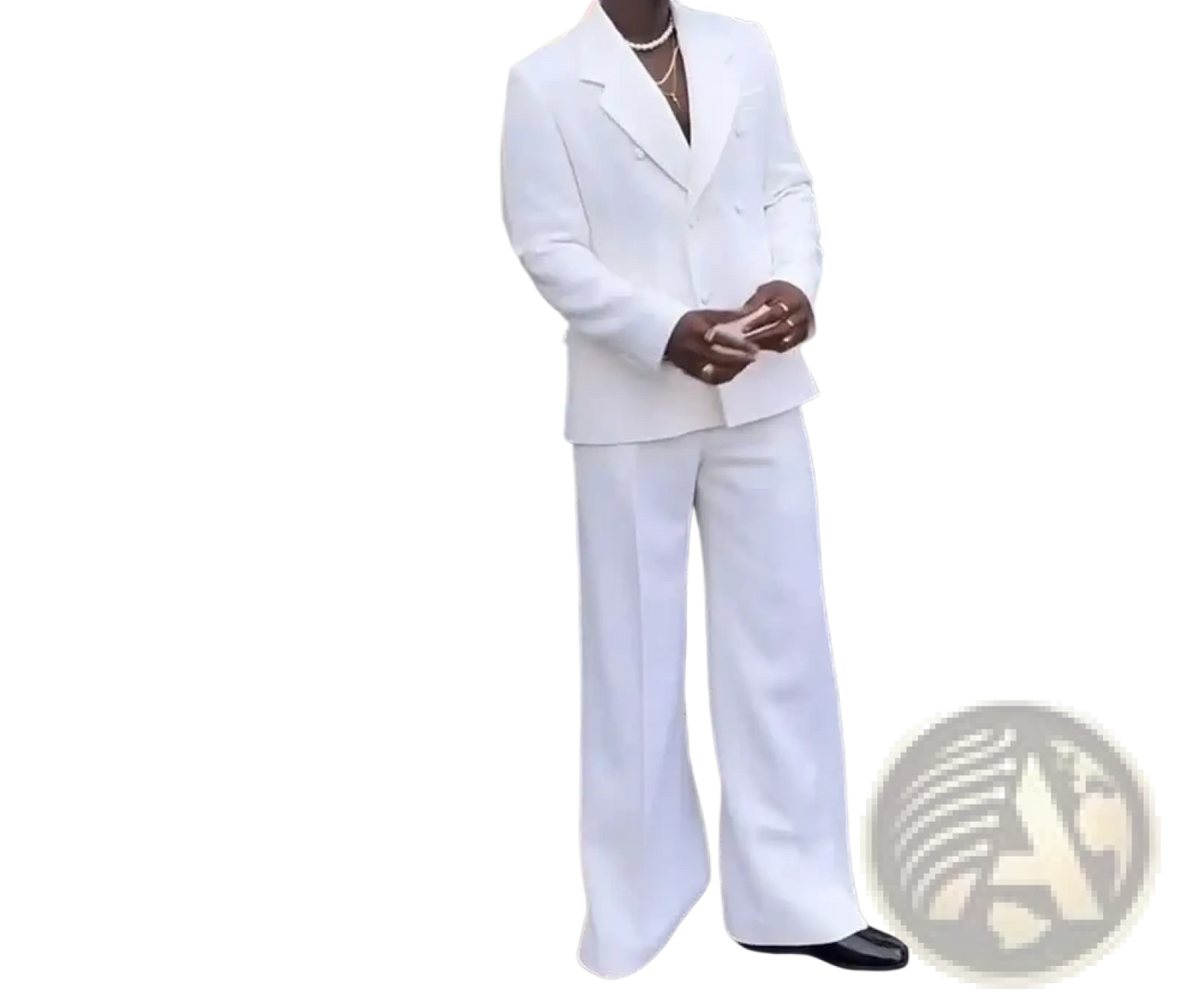 A crisp white double-breasted mens wedding tuxedo suit with wide-leg trousers crafted from smooth fabric